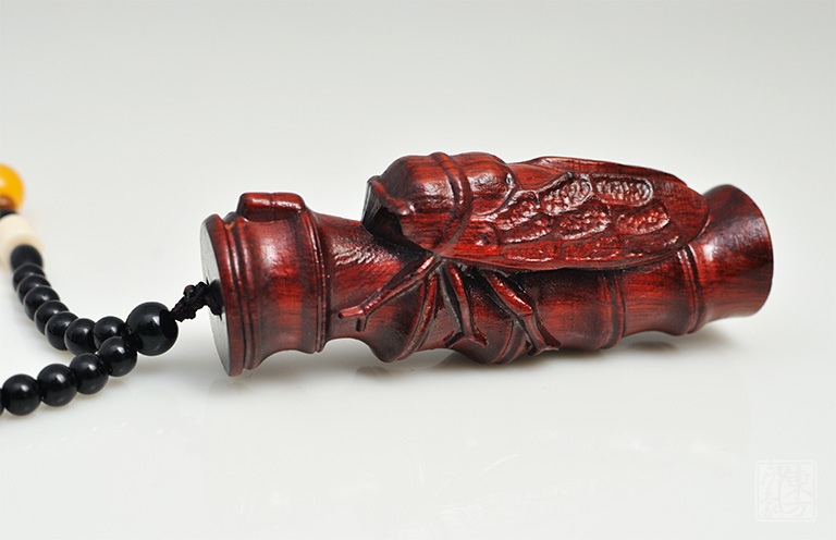 赞比亚血檀木雕手玩件：一鸣惊人